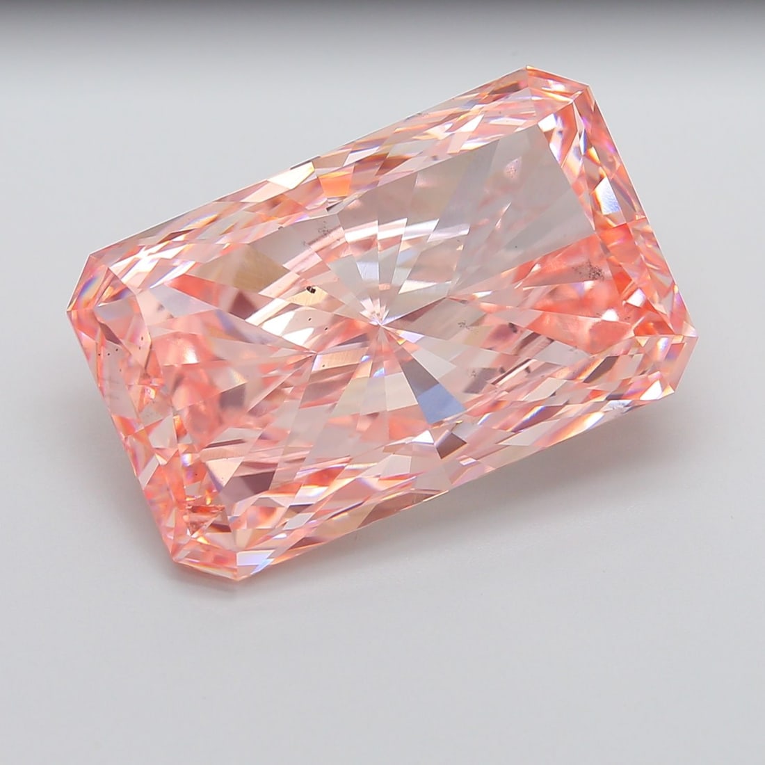 Loose Diamond - RADIANT 29.13ct Fancy Vivid Pink VS2: Loose Diamond - RADIANT 29.13ct Fancy Vivid Pink VS2 Source: This is a real non-mined Diamond that has been grown in a lab Shape: RADIANT Carats: 29.13 Color: Fancy Vivid Pink Certification: IGI The D