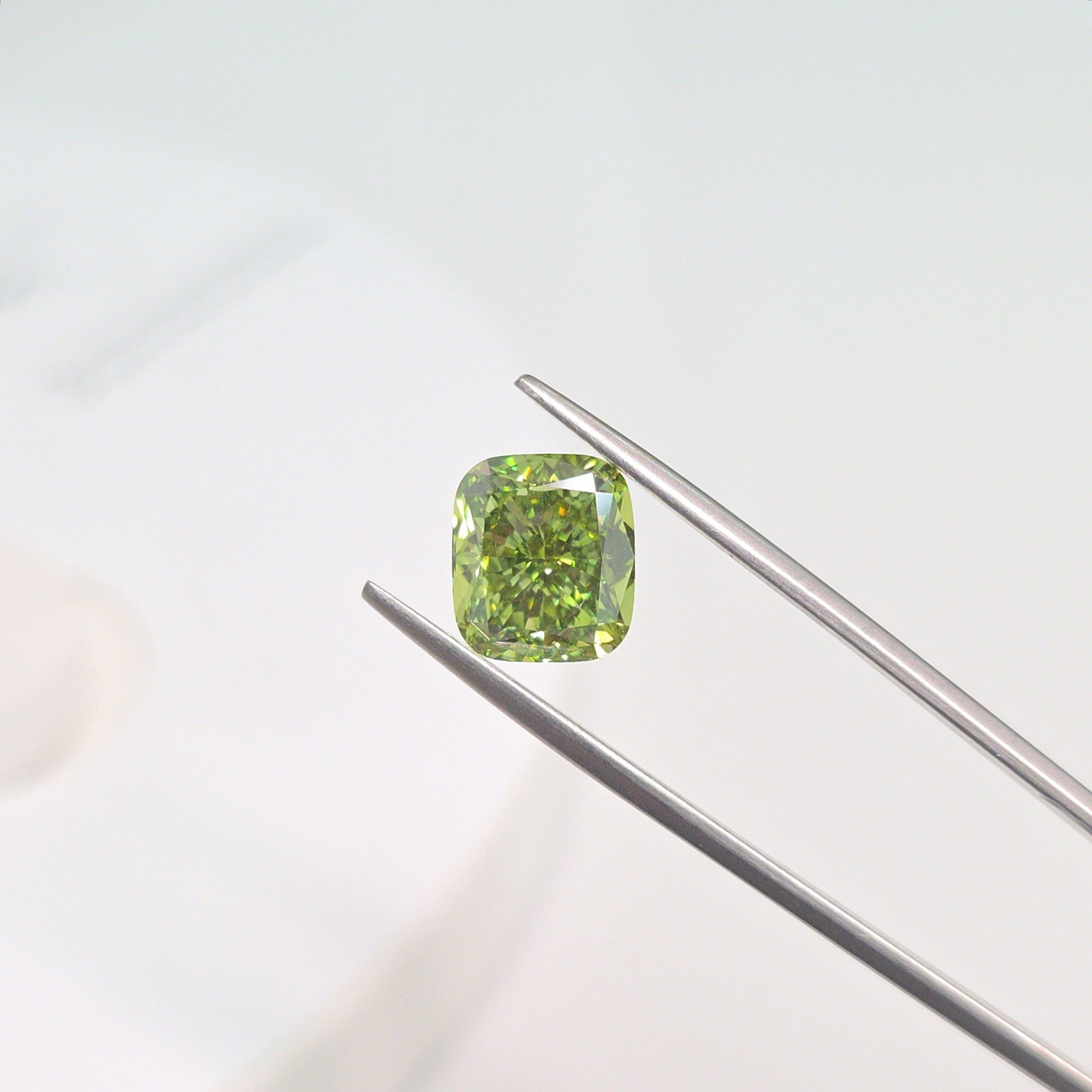 Loose Diamond - CUSHION MODIFIED 4.13ct Fancy Vivid Green VS1: Loose Diamond - CUSHION MODIFIED 4.13ct Fancy Vivid Green VS1 Source: This is a real non-mined Diamond that has been grown in a lab Shape: CUSHION MODIFIED Carats: 4.13 Color: Fancy Vivid Green Certif