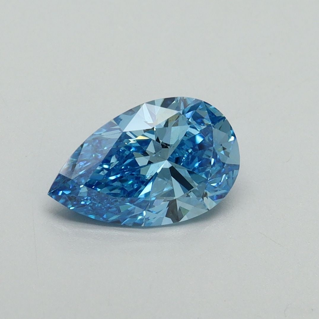 Loose Diamond - PEAR 1.04ct Fancy Vivid Blue VS1: Loose Diamond - PEAR 1.04ct Fancy Vivid Blue VS1 Source: This is a real non-mined Diamond that has been grown in a lab Shape: PEAR Carats: 1.04 Color: Fancy Vivid Blue Certification: IGI Video:
