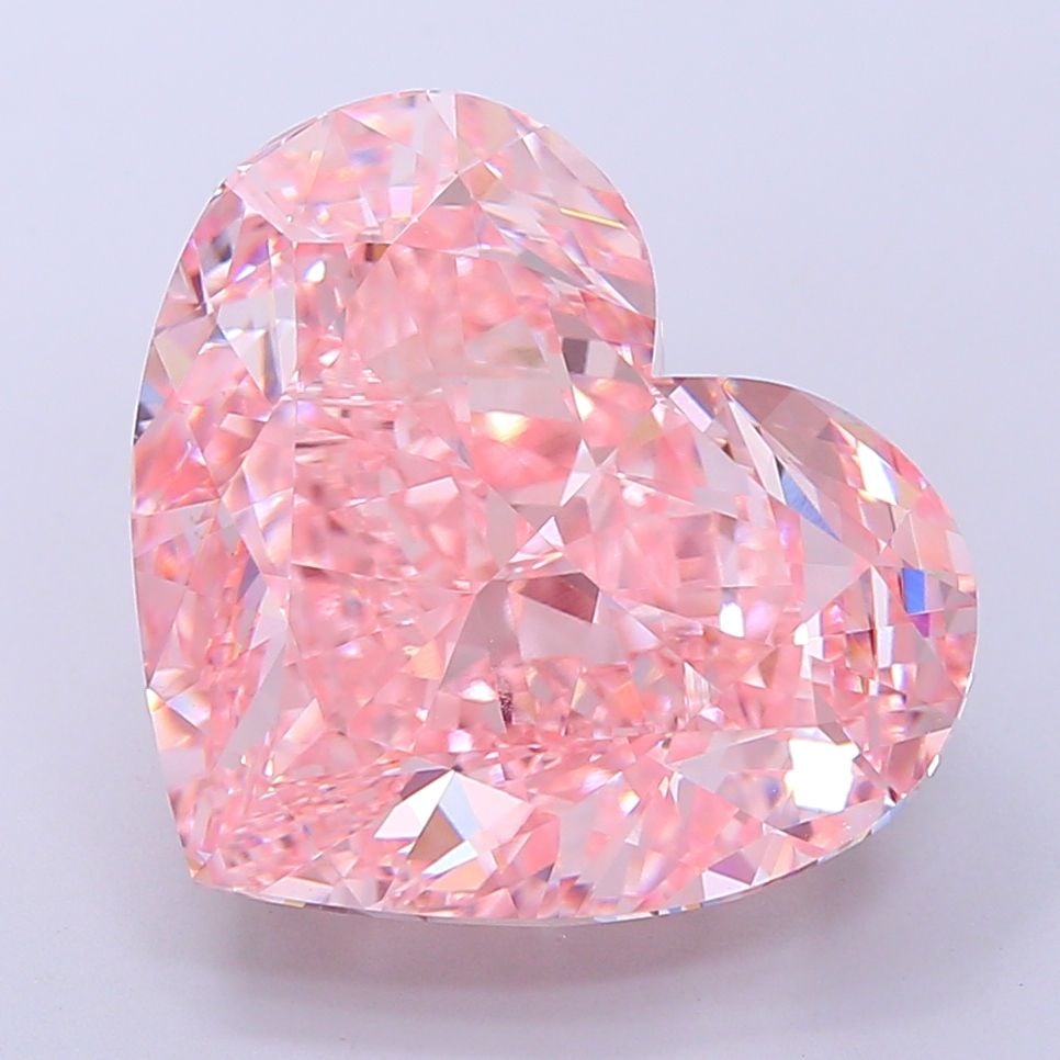 Loose Diamond - HEART 14.74ct Fancy Vivid Pink VVS2: Loose Diamond - HEART 14.74ct Fancy Vivid Pink VVS2 Source: This is a real non-mined Diamond that has been grown in a lab Shape: HEART Carats: 14.74 Color: Fancy Vivid Pink Certification: IGI Video: