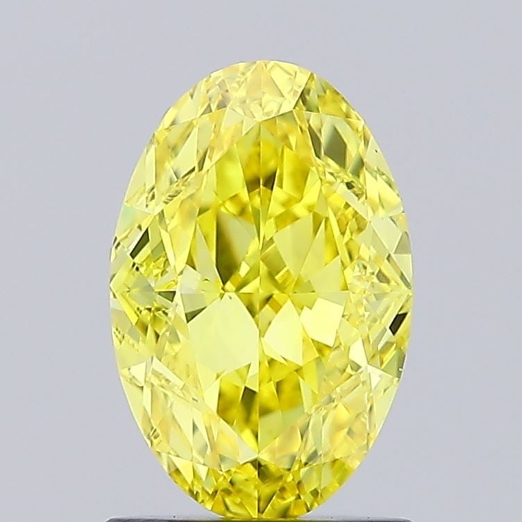 Loose Diamond - OVAL 1.2ct Fancy Vivid Yellow VVS2: Loose Diamond - OVAL 1.2ct Fancy Vivid Yellow VVS2 Source: This is a real non-mined Diamond that has been grown in a lab Shape: OVAL Carats: 1.2 Color: Fancy Vivid Yellow Certification: IGI Video: