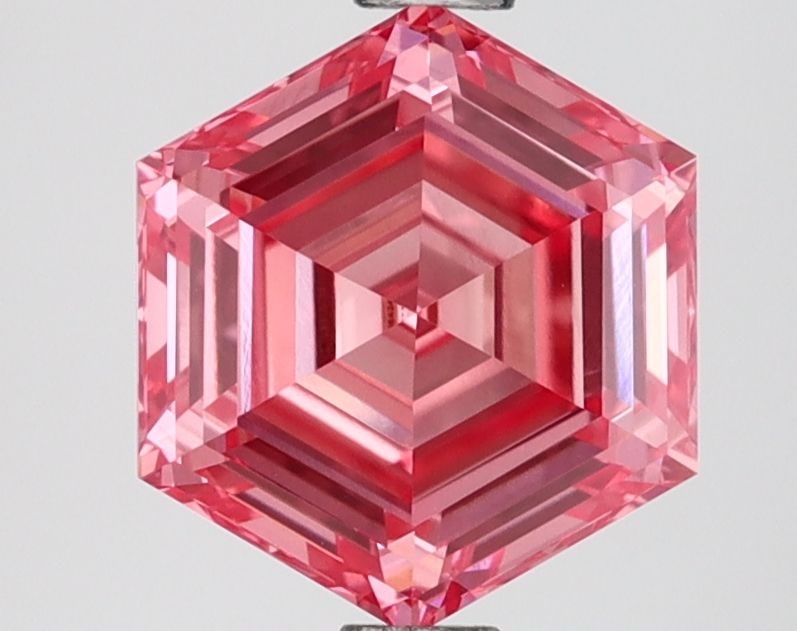 Loose Diamond - HEXAGONAL 1.89ct Fancy Vivid Pink VVS2: Loose Diamond - HEXAGONAL 1.89ct Fancy Vivid Pink VVS2 Source: This is a real non-mined Diamond that has been grown in a lab Shape: HEXAGONAL Carats: 1.89 Color: Fancy Vivid Pink Certification: IGI Vi