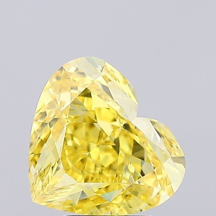 Loose Diamond - HEART 5.09ct Fancy Vivid Yellow VS1: Loose Diamond - HEART 5.09ct Fancy Vivid Yellow VS1 Source: This is a real non-mined Diamond that has been grown in a lab Shape: HEART Carats: 5.09 Color: Fancy Vivid Yellow Certification: IGI Video: