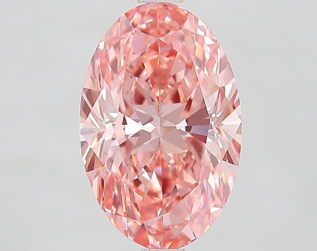 Loose Diamond - OVAL 3.0ct Fancy Vivid Orange Pink VS1: Loose Diamond - OVAL 3.0ct Fancy Vivid Orange Pink VS1 Source: This is a real non-mined Diamond that has been grown in a lab Shape: OVAL Carats: 3.0 Color: Fancy Vivid Orange Pink Certification: IGI V