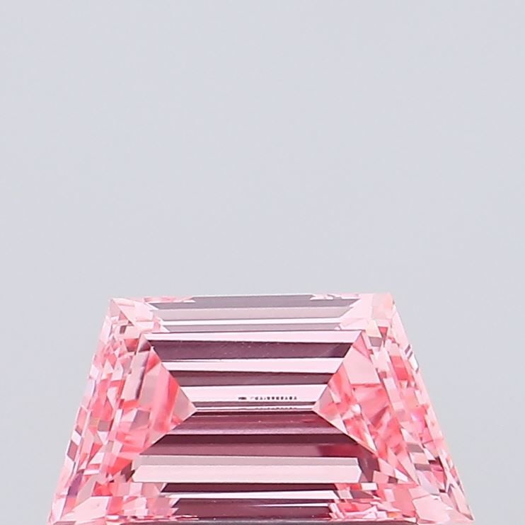 Loose Diamond - TRAPEZOID 0.79ct Fancy Vivid Pink VVS2: Loose Diamond - TRAPEZOID 0.79ct Fancy Vivid Pink VVS2 Source: This is a real non-mined Diamond that has been grown in a lab Shape: TRAPEZOID Carats: 0.79 Color: Fancy Vivid Pink Certification: IGI Vi
