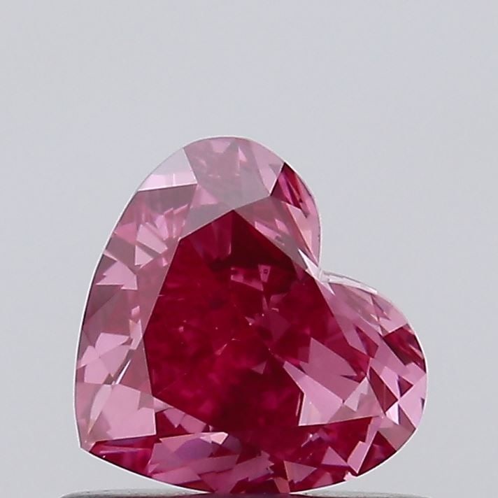 Loose Diamond - HEART 0.72ct Fancy Vivid Pink VVS2: Loose Diamond - HEART 0.72ct Fancy Vivid Pink VVS2 Source: This is a real non-mined Diamond that has been grown in a lab Shape: HEART Carats: 0.72 Color: Fancy Vivid Pink Certification: IGI Video: