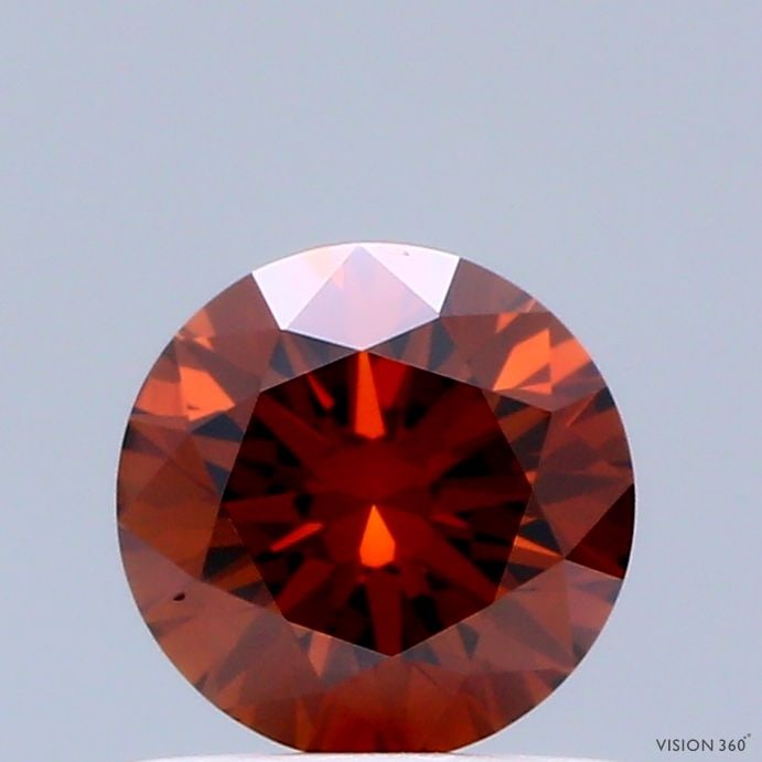 Ideal Loose Diamond - ROUND 0.65ct Fancy Deep Orange VS1: Ideal Loose Diamond - ROUND 0.65ct Fancy Deep Orange VS1 Source: This is a real non-mined Diamond that has been grown in a lab Shape: ROUND Carats: 0.65 Color: Fancy Deep Orange Certification: IGI Vid