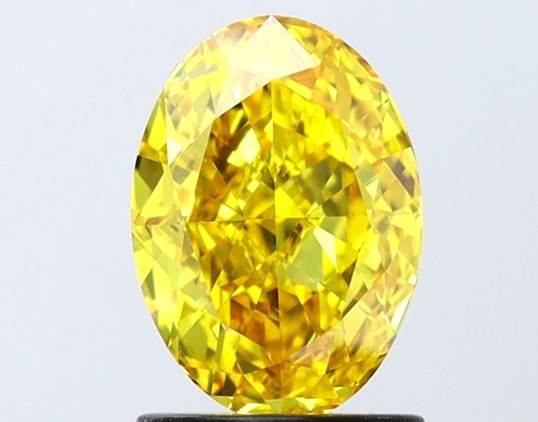 Loose Diamond - OVAL 1.47ct Fancy Vivid Yellow VS1: Loose Diamond - OVAL 1.47ct Fancy Vivid Yellow VS1 Source: This is a real non-mined Diamond that has been grown in a lab Shape: OVAL Carats: 1.47 Color: Fancy Vivid Yellow Certification: IGI Video: