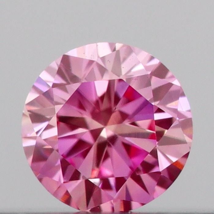 Loose Diamond - ROUND 0.13ct Fancy Vivid Pink VVS2: Loose Diamond - ROUND 0.13ct Fancy Vivid Pink VVS2 Source: This is a real non-mined Diamond that has been grown in a lab Shape: ROUND Carats: 0.13 Color: Fancy Vivid Pink Certification: IGI Video:
