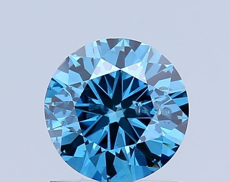 Loose Diamond - ROUND 0.9ct Fancy Vivid Blue I1: Loose Diamond - ROUND 0.9ct Fancy Vivid Blue I1 Source: This is a real non-mined Diamond that has been grown in a lab Shape: ROUND Carats: 0.9 Color: Fancy Vivid Blue Certification: NONE Video: