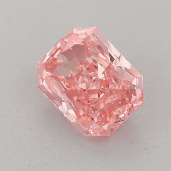 Loose Diamond - RADIANT 0.89ct Fancy Vivid Pink VS2: Loose Diamond - RADIANT 0.89ct Fancy Vivid Pink VS2 Source: This is a real non-mined Diamond that has been grown in a lab Shape: RADIANT Carats: 0.89 Color: Fancy Vivid Pink Certification: IGI Video:
