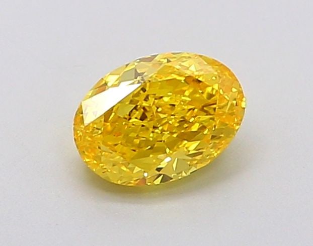 Loose Diamond - OVAL 0.65ct Fancy Vivid Yellow VVS2: Loose Diamond - OVAL 0.65ct Fancy Vivid Yellow VVS2 Source: This is a real non-mined Diamond that has been grown in a lab Shape: OVAL Carats: 0.65 Color: Fancy Vivid Yellow Certification: IGI Video: