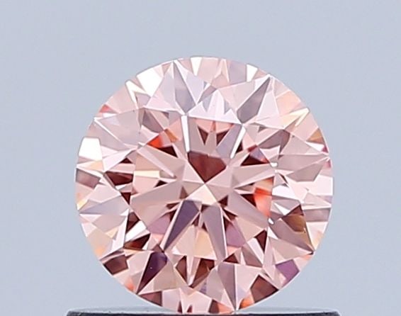 Ideal Loose Diamond - ROUND 0.66ct Fancy Vivid Orange Pink VS1: Ideal Loose Diamond - ROUND 0.66ct Fancy Vivid Orange Pink VS1 Source: This is a real non-mined Diamond that has been grown in a lab Shape: ROUND Carats: 0.66 Color: Fancy Vivid Orange Pink Certificat