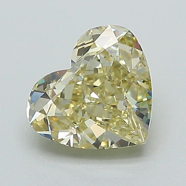 Loose Diamond - HEART 1.04ct Fancy Yellow VVS2: Loose Diamond - HEART 1.04ct Fancy Yellow VVS2 Source: This is a real non-mined Diamond that has been grown in a lab Shape: HEART Carats: 1.04 Color: Fancy Yellow Certification: IGI Video: