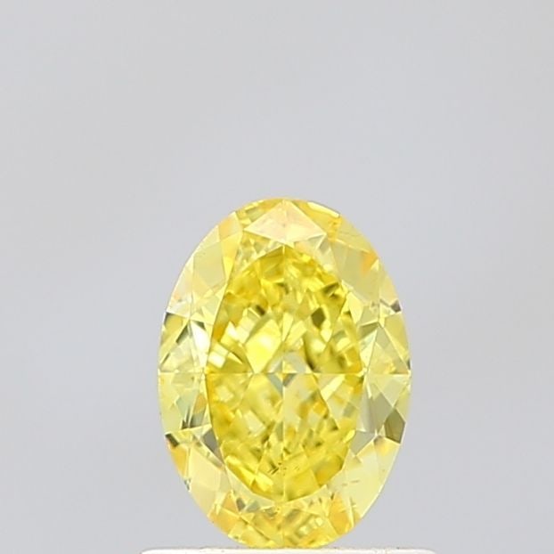 Loose Diamond - OVAL 1.02ct Fancy Vivid Yellow VS2: Loose Diamond - OVAL 1.02ct Fancy Vivid Yellow VS2 Source: This is a real non-mined Diamond that has been grown in a lab Shape: OVAL Carats: 1.02 Color: Fancy Vivid Yellow Certification: IGI Video: