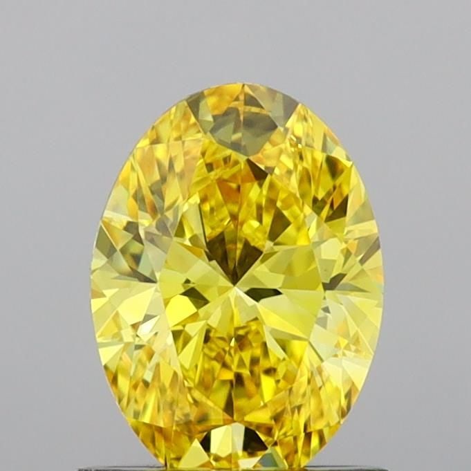 Loose Diamond - OVAL 1.0ct Fancy Vivid Yellow VVS2: Loose Diamond - OVAL 1.0ct Fancy Vivid Yellow VVS2 Source: This is a real non-mined Diamond that has been grown in a lab Shape: OVAL Carats: 1.0 Color: Fancy Vivid Yellow Certification: IGI Video:
