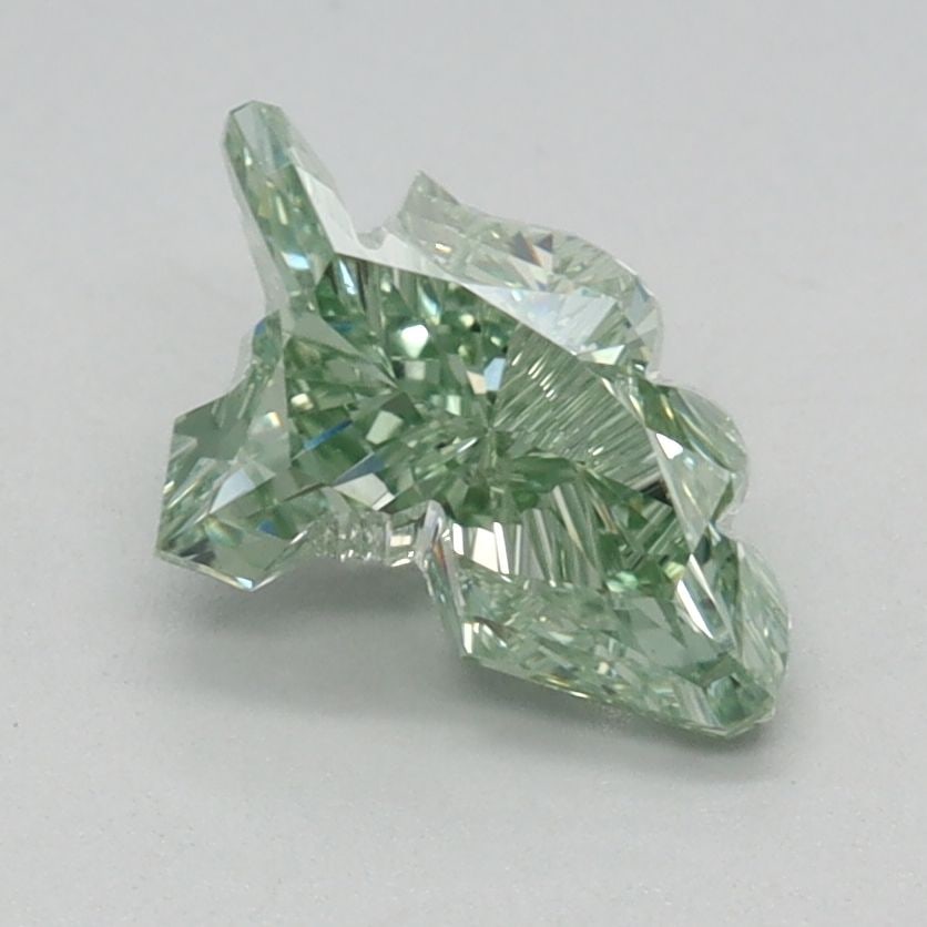 Loose Diamond - OTHER 0.99ct Fancy Vivid Green VS1: Loose Diamond - OTHER 0.99ct Fancy Vivid Green VS1 Source: This is a real non-mined Diamond that has been grown in a lab Shape: OTHER Carats: 0.99 Color: Fancy Vivid Green Certification: IGI Video: