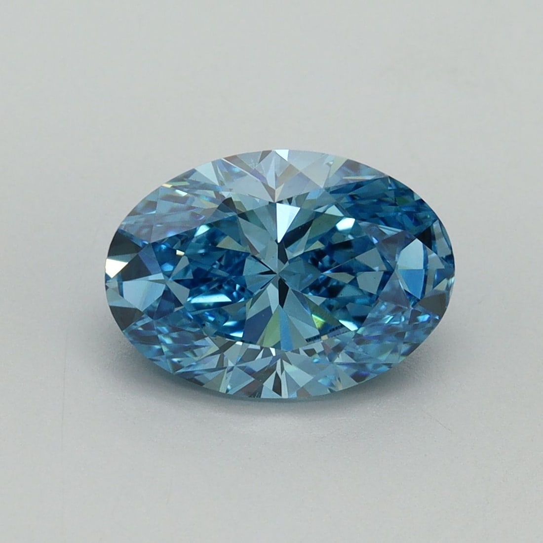 Loose Diamond - OVAL 2.12ct Fancy Vivid Blue VS2: Loose Diamond - OVAL 2.12ct Fancy Vivid Blue VS2 Source: This is a real non-mined Diamond that has been grown in a lab Shape: OVAL Carats: 2.12 Color: Fancy Vivid Blue Certification: IGI Video: