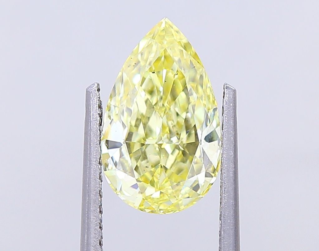 Loose Diamond - PEAR 1.5ct Fancy Intense Yellow VS2: Loose Diamond - PEAR 1.5ct Fancy Intense Yellow VS2 Source: This is a real non-mined Diamond that has been grown in a lab Shape: PEAR Carats: 1.5 Color: Fancy Intense Yellow Certification: IGI Video: