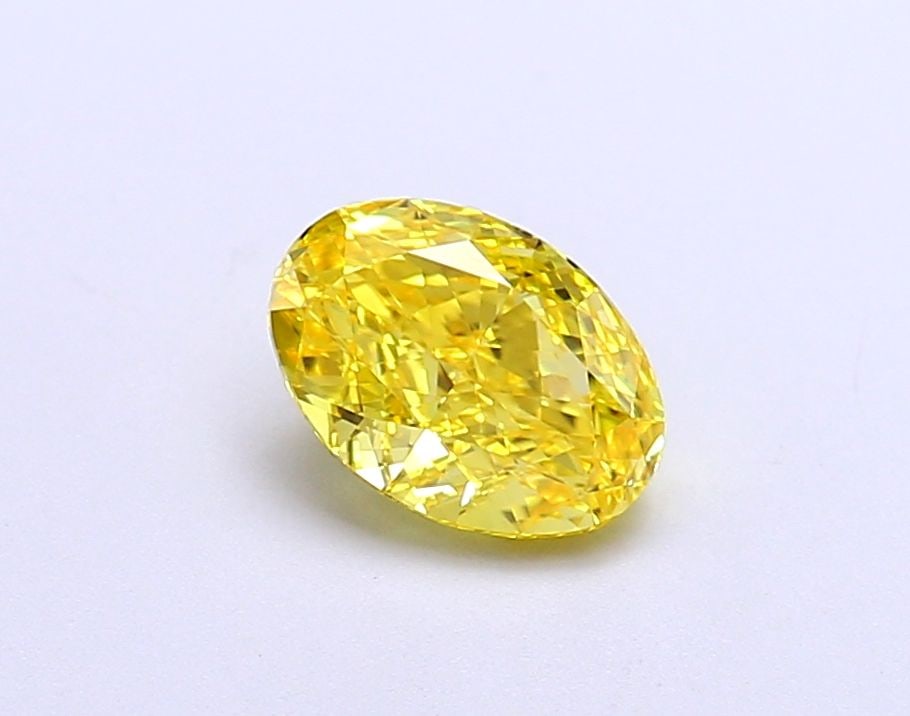 Loose Diamond - OVAL 1.02ct Fancy Vivid Yellow VS1: Loose Diamond - OVAL 1.02ct Fancy Vivid Yellow VS1 Source: This is a real non-mined Diamond that has been grown in a lab Shape: OVAL Carats: 1.02 Color: Fancy Vivid Yellow Certification: IGI Video: