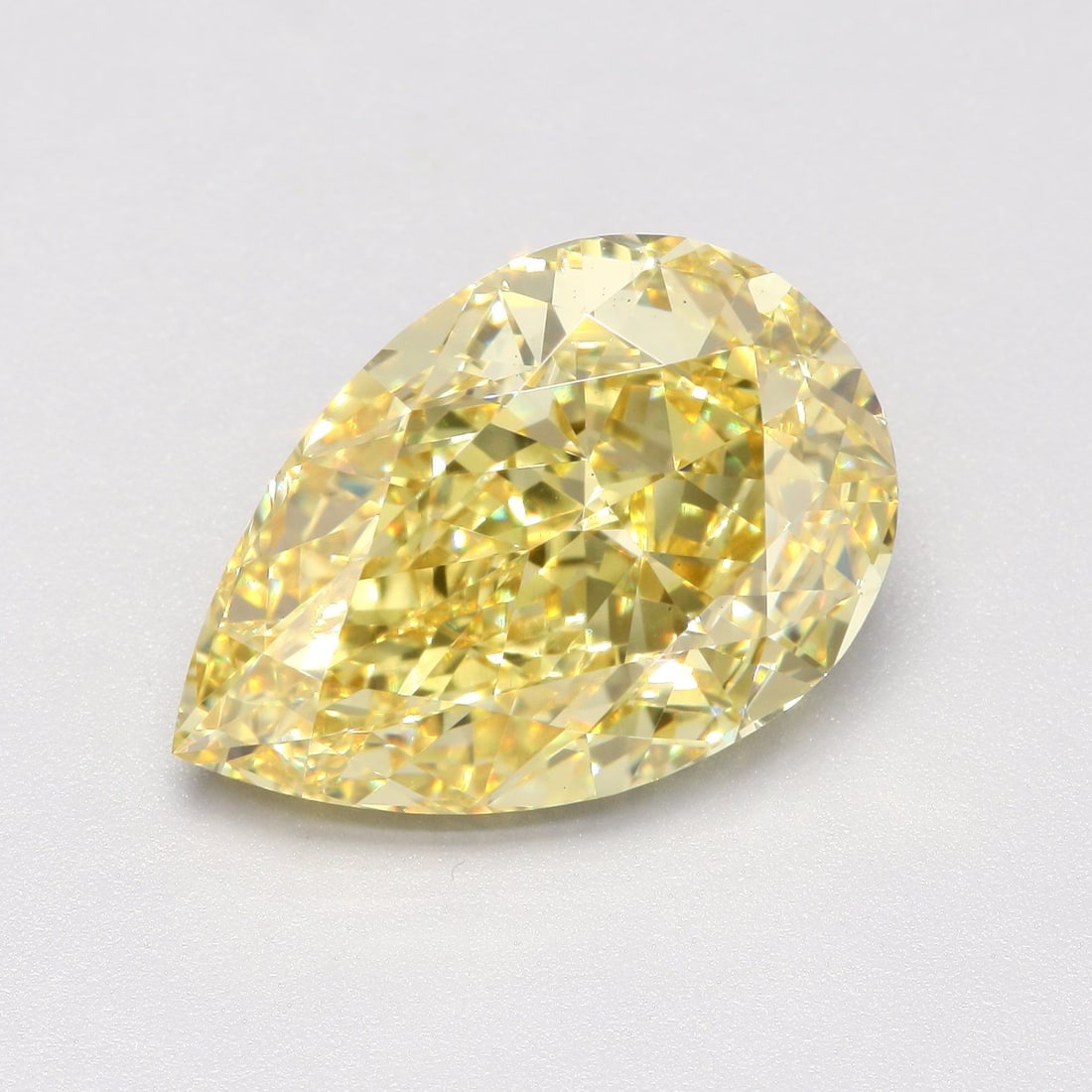 Loose Diamond - PEAR 6.05ct Fancy Vivid Yellow VS1: Loose Diamond - PEAR 6.05ct Fancy Vivid Yellow VS1 Source: This is a real non-mined Diamond that has been grown in a lab Shape: PEAR Carats: 6.05 Color: Fancy Vivid Yellow Certification: IGI Video: