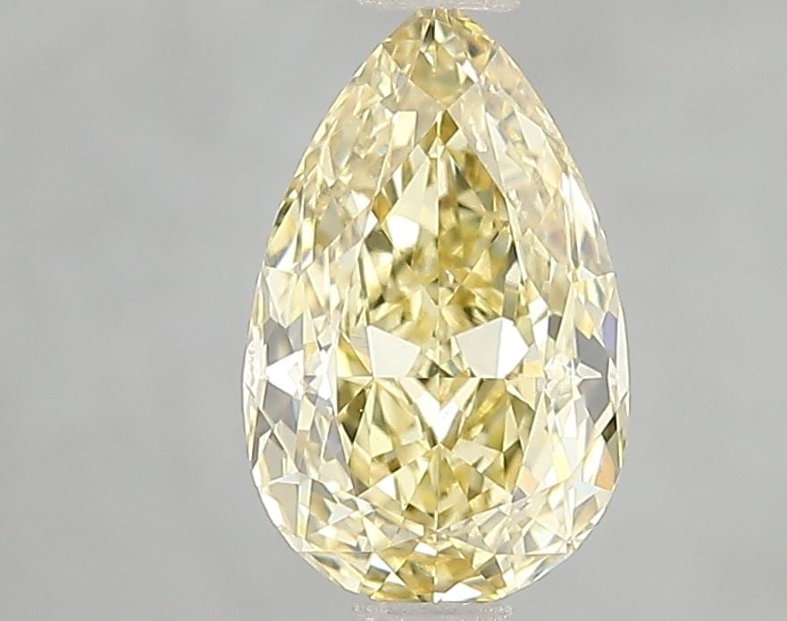 Loose Diamond - PEAR 1.59ct Fancy Vivid Yellow VS2: Loose Diamond - PEAR 1.59ct Fancy Vivid Yellow VS2 Source: This is a real non-mined Diamond that has been grown in a lab Shape: PEAR Carats: 1.59 Color: Fancy Vivid Yellow Certification: IGI Video: