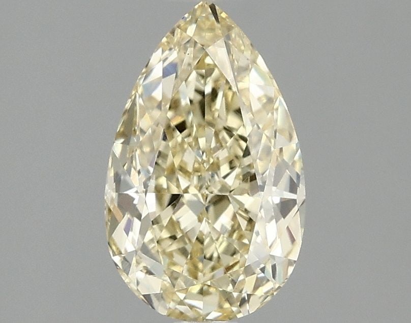 Loose Diamond - PEAR 1.54ct Fancy Vivid Yellow VS1: Loose Diamond - PEAR 1.54ct Fancy Vivid Yellow VS1 Source: This is a real non-mined Diamond that has been grown in a lab Shape: PEAR Carats: 1.54 Color: Fancy Vivid Yellow Certification: IGI Video: