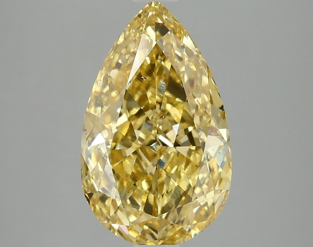 Loose Diamond - PEAR 3.0ct Fancy Vivid Yellow VS2: Loose Diamond - PEAR 3.0ct Fancy Vivid Yellow VS2 Source: This is a real non-mined Diamond that has been grown in a lab Shape: PEAR Carats: 3.0 Color: Fancy Vivid Yellow Certification: IGI Video: