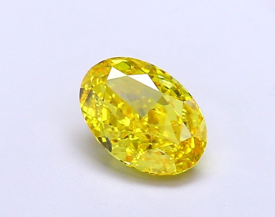 Loose Diamond - OVAL 1.29ct Fancy Vivid Yellow VS1: Loose Diamond - OVAL 1.29ct Fancy Vivid Yellow VS1 Source: This is a real non-mined Diamond that has been grown in a lab Shape: OVAL Carats: 1.29 Color: Fancy Vivid Yellow Certification: IGI Video: