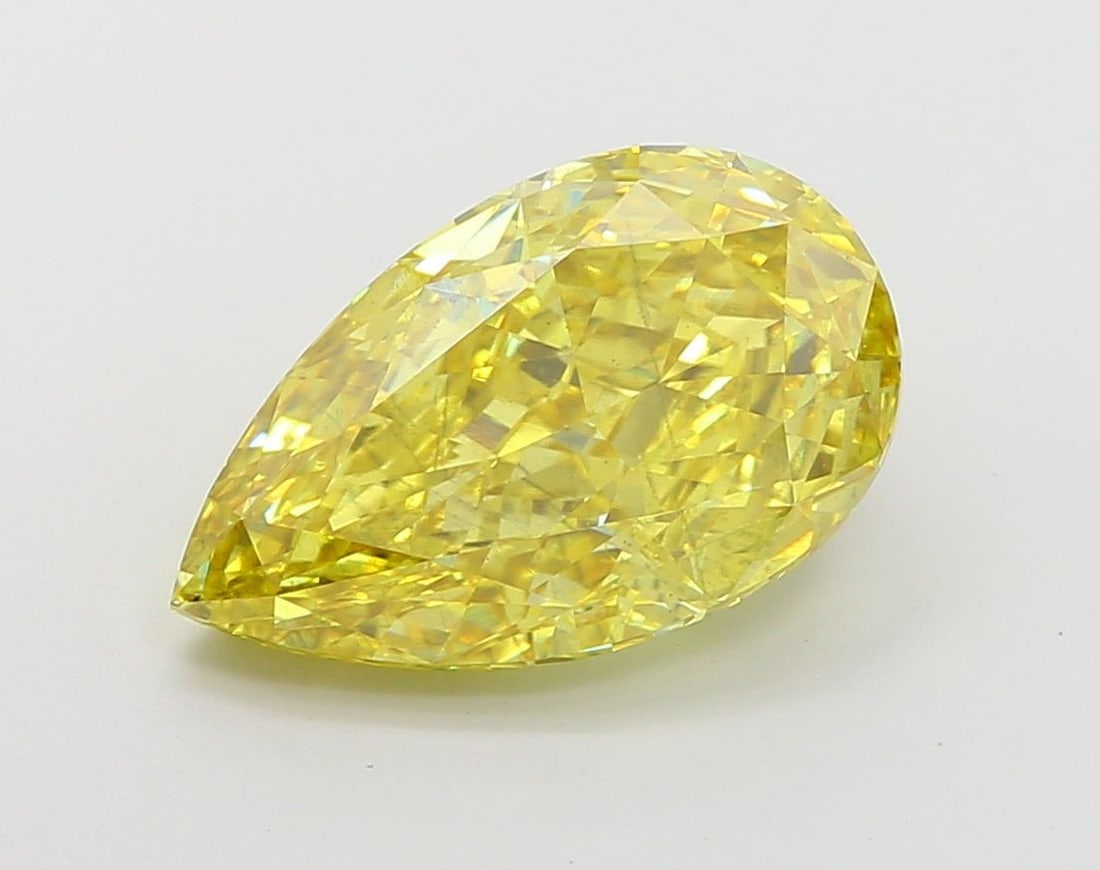 Loose Diamond - PEAR 5.55ct Fancy Vivid Yellow SI1: Loose Diamond - PEAR 5.55ct Fancy Vivid Yellow SI1 Source: This is a real non-mined Diamond that has been grown in a lab Shape: PEAR Carats: 5.55 Color: Fancy Vivid Yellow Certification: IGI Video: