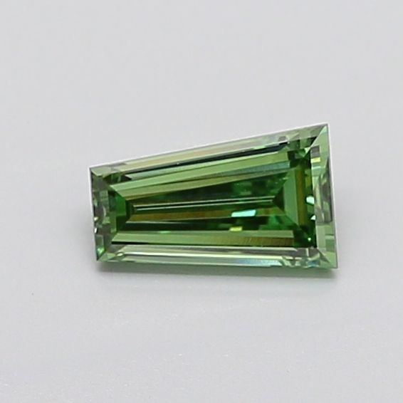 Loose Diamond - TAPERED BAGUETTE 0.77ct Fancy Vivid Green VVS2: Loose Diamond - TAPERED BAGUETTE 0.77ct Fancy Vivid Green VVS2 Source: This is a real non-mined Diamond that has been grown in a lab Shape: TAPERED BAGUETTE Carats: 0.77 Color: Fancy Vivid Green Certi