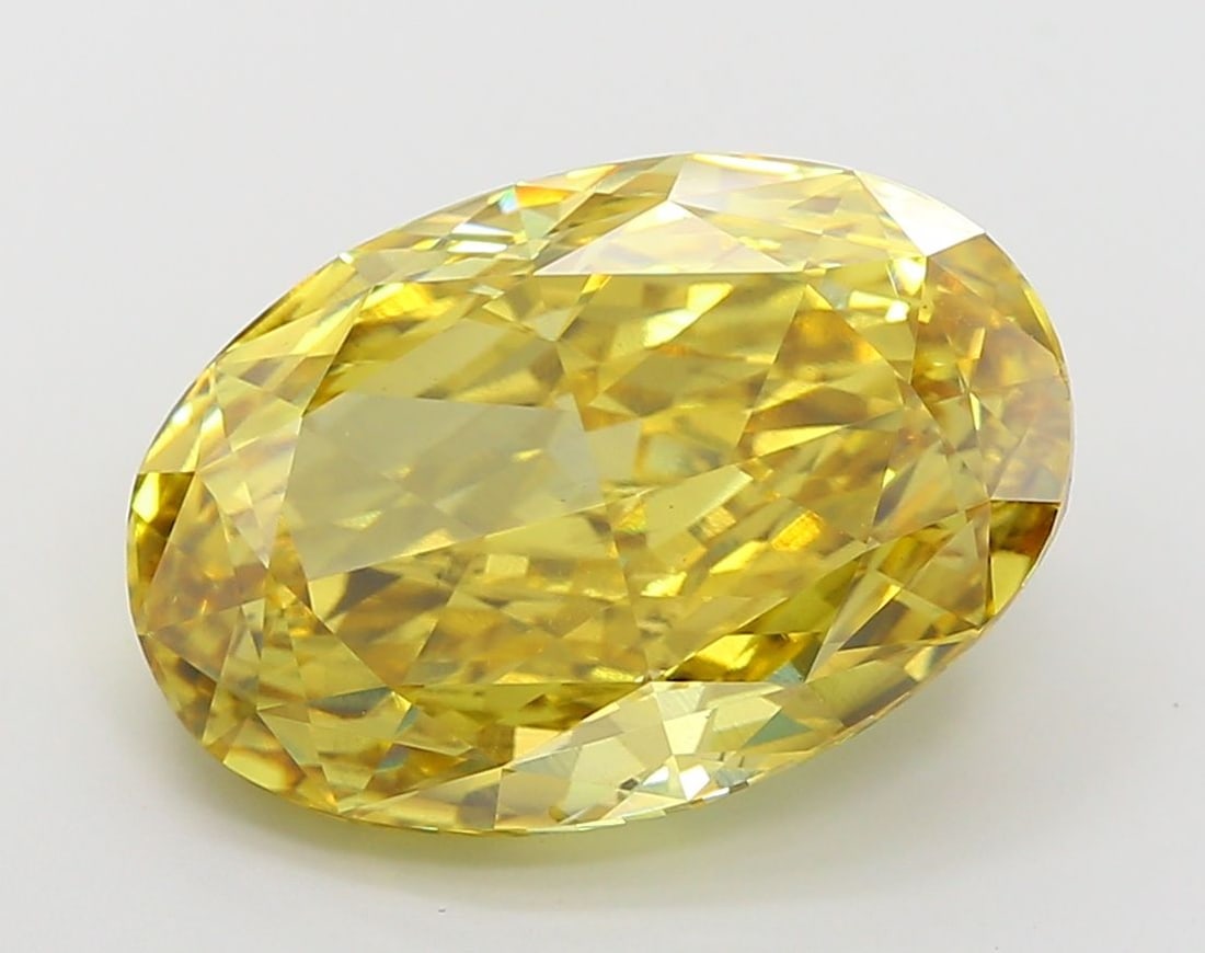 Loose Diamond - OVAL 9.04ct Fancy Vivid Yellow VS2: Loose Diamond - OVAL 9.04ct Fancy Vivid Yellow VS2 Source: This is a real non-mined Diamond that has been grown in a lab Shape: OVAL Carats: 9.04 Color: Fancy Vivid Yellow Certification: IGI Video: