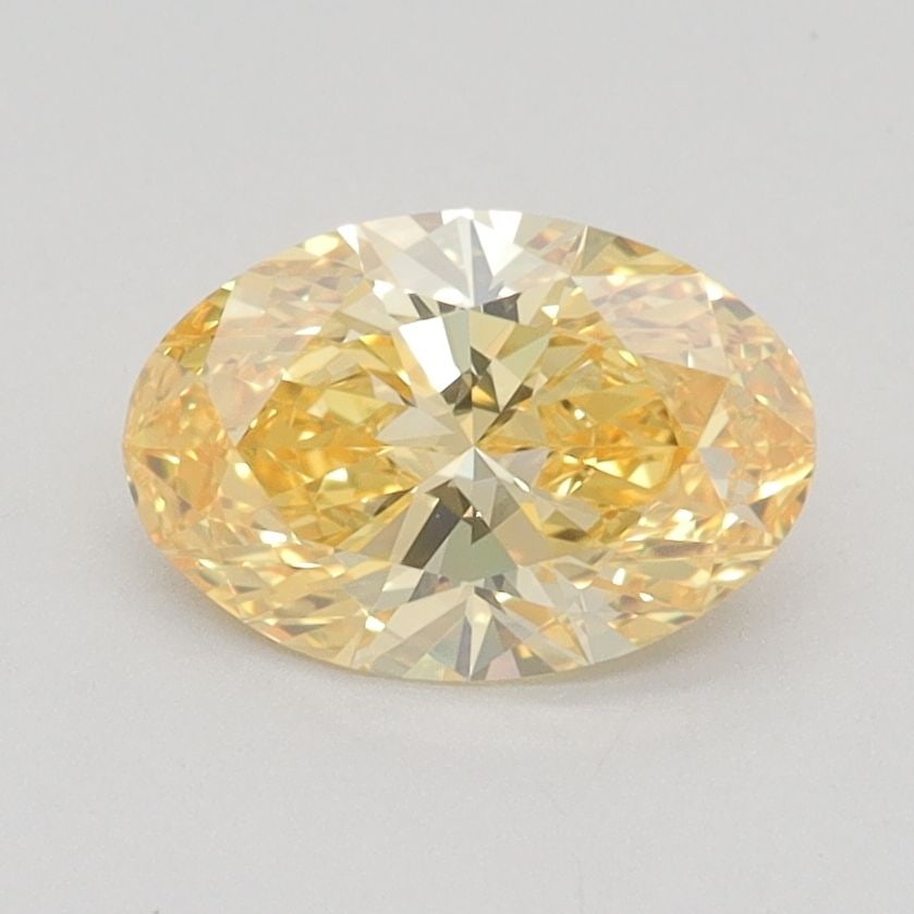 Loose Diamond - OVAL 1.08ct Fancy Vivid Yellow VS1: Loose Diamond - OVAL 1.08ct Fancy Vivid Yellow VS1 Source: This is a real non-mined Diamond that has been grown in a lab Shape: OVAL Carats: 1.08 Color: Fancy Vivid Yellow Certification: IGI Video: