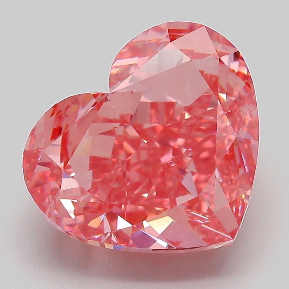 Loose Diamond - HEART 7.53ct Fancy Vivid Pink VS1: Loose Diamond - HEART 7.53ct Fancy Vivid Pink VS1 Source: This is a real non-mined Diamond that has been grown in a lab Shape: HEART Carats: 7.53 Color: Fancy Vivid Pink Certification: IGI Video: