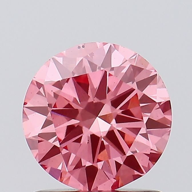 Loose Diamond - ROUND 1.0ct Fancy Pink SI2: Loose Diamond - ROUND 1.0ct Fancy Pink SI2 Source: This is a real non-mined Diamond that has been grown in a lab Shape: ROUND Carats: 1.0 Color: Fancy Pink Certification: NONE Video: