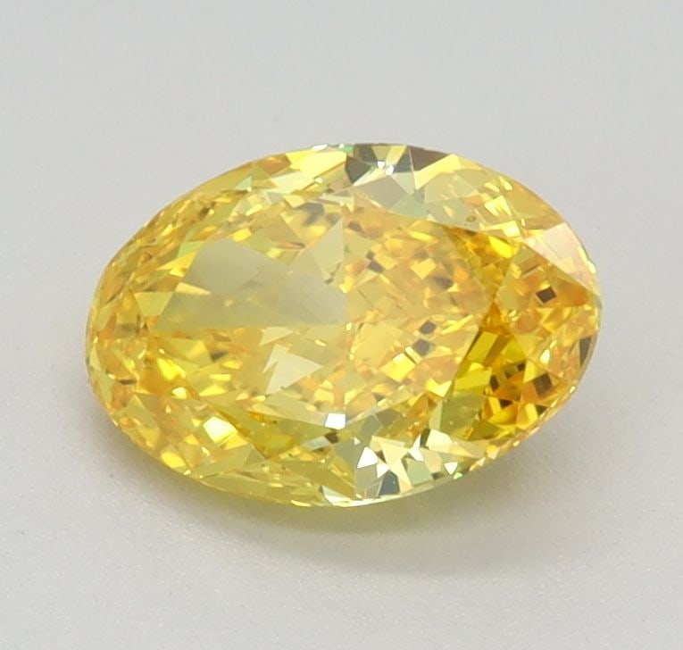 Loose Diamond - OVAL 0.79ct Fancy Vivid Yellow VS1: Loose Diamond - OVAL 0.79ct Fancy Vivid Yellow VS1 Source: This is a real non-mined Diamond that has been grown in a lab Shape: OVAL Carats: 0.79 Color: Fancy Vivid Yellow Certification: IGI Video: