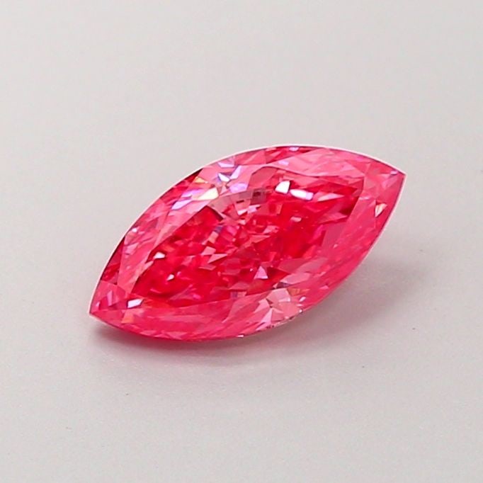 Loose Diamond - MARQUISE 0.89ct Fancy Vivid Pink VVS2: Loose Diamond - MARQUISE 0.89ct Fancy Vivid Pink VVS2 Source: This is a real non-mined Diamond that has been grown in a lab Shape: MARQUISE Carats: 0.89 Color: Fancy Vivid Pink Certification: IGI Vide