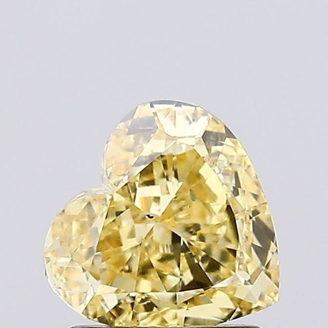 Loose Diamond - HEART 1.18ct Fancy Vivid Yellow VS2: Loose Diamond - HEART 1.18ct Fancy Vivid Yellow VS2 Source: This is a real non-mined Diamond that has been grown in a lab Shape: HEART Carats: 1.18 Color: Fancy Vivid Yellow Certification: IGI Video: