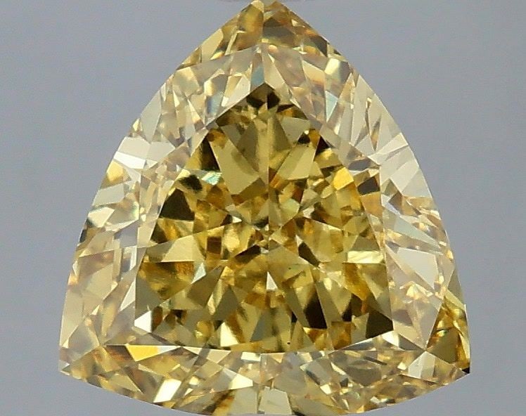 Loose Diamond - TRIANGULAR 3.09ct Fancy Vivid Yellow VS1: Loose Diamond - TRIANGULAR 3.09ct Fancy Vivid Yellow VS1 Source: This is a real non-mined Diamond that has been grown in a lab Shape: TRIANGULAR Carats: 3.09 Color: Fancy Vivid Yellow Certification: I