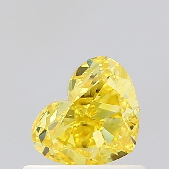 Loose Diamond - HEART 0.62ct Fancy Vivid Yellow VVS2: Loose Diamond - HEART 0.62ct Fancy Vivid Yellow VVS2 Source: This is a real non-mined Diamond that has been grown in a lab Shape: HEART Carats: 0.62 Color: Fancy Vivid Yellow Certification: NONE Video