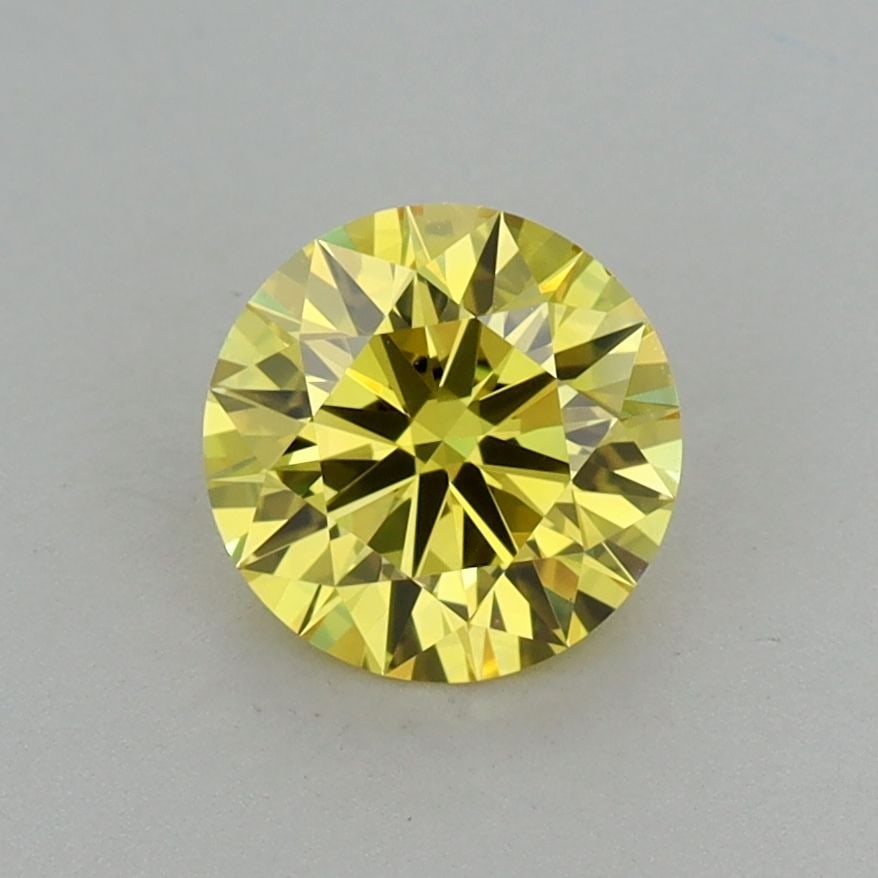 Ideal Loose Diamond - ROUND 1.01ct Fancy Vivid Yellow VS1: Ideal Loose Diamond - ROUND 1.01ct Fancy Vivid Yellow VS1 Source: This is a real non-mined Diamond that has been grown in a lab Shape: ROUND Carats: 1.01 Color: Fancy Vivid Yellow Certification: IGI V