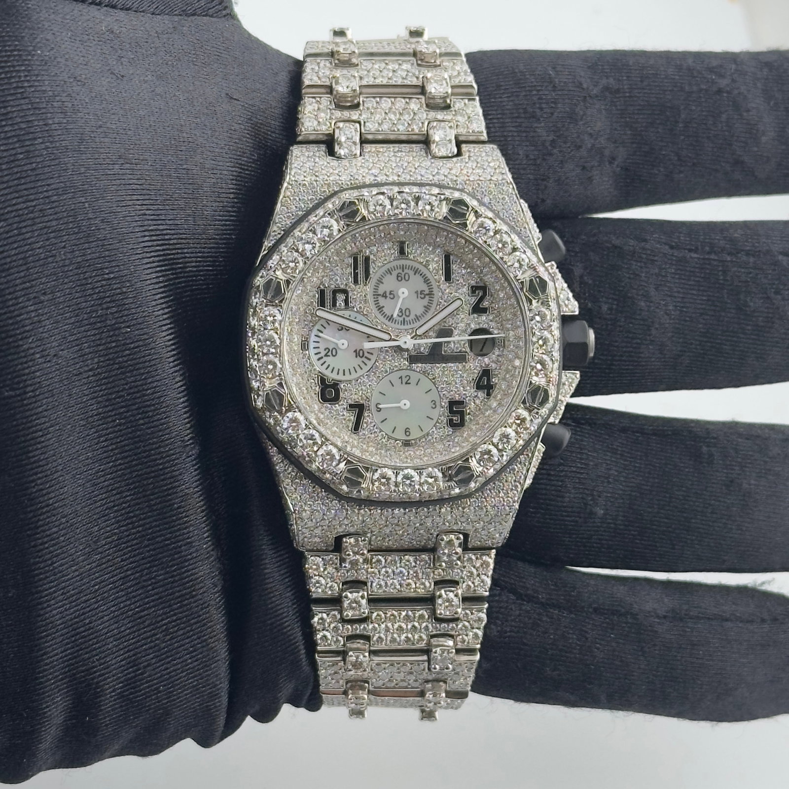 Royal Oak Offshore 25770ST Diamond Arabic Dial Watch with Papers 2006: Royal Oak Offshore 25770ST Diamond Arabic Dial Watch with Papers 2006 This Audemars Piguet Royal Oak Offshore watch features a striking iced out Arabic dial and a diamond bezel. The watch is equipped 