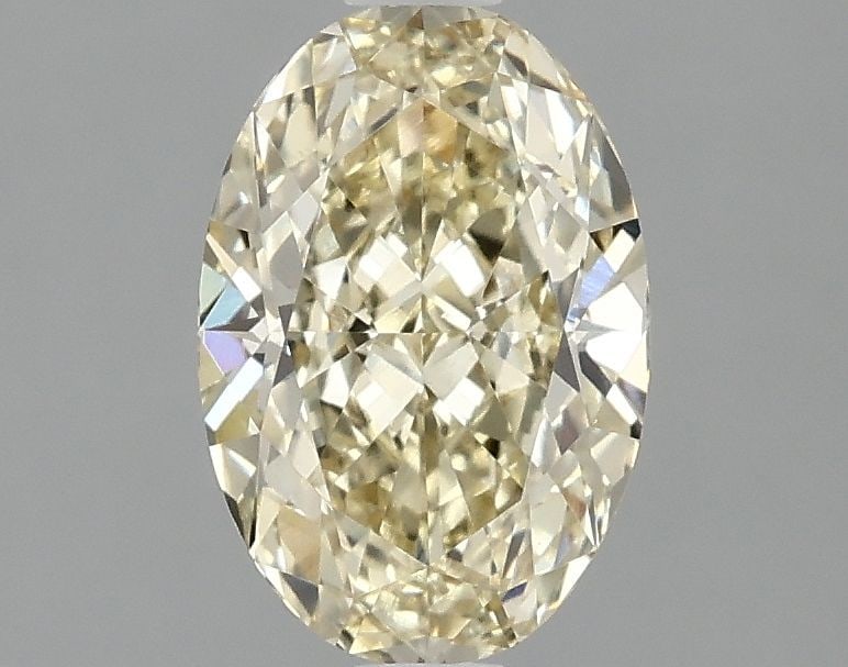 Loose Diamond - OVAL 1.59ct Fancy Intense Yellow VVS2: Loose Diamond - OVAL 1.59ct Fancy Intense Yellow VVS2 Source: This is a real non-mined Diamond that has been grown in a lab Shape: OVAL Carats: 1.59 Color: Fancy Intense Yellow Certification: IGI
