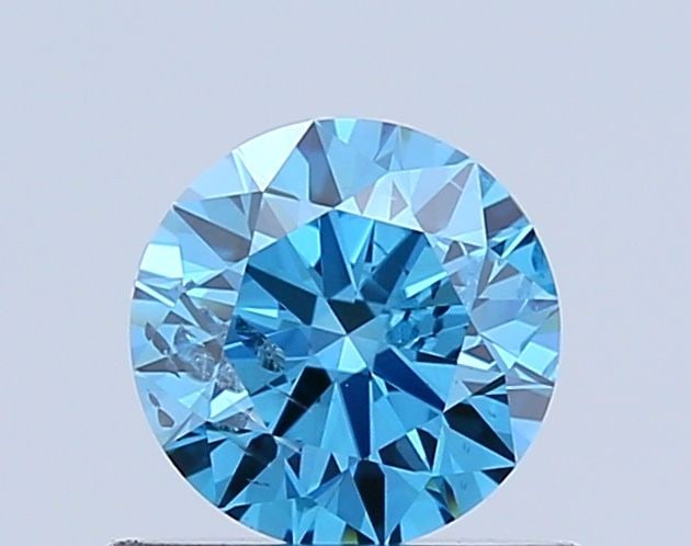 Loose Diamond - ROUND 0.56ct Fancy Vivid Blue I1: Loose Diamond - ROUND 0.56ct Fancy Vivid Blue I1 Source: This is a real non-mined Diamond that has been grown in a lab Shape: ROUND Carats: 0.56 Color: Fancy Vivid Blue Certification: NONE Video: