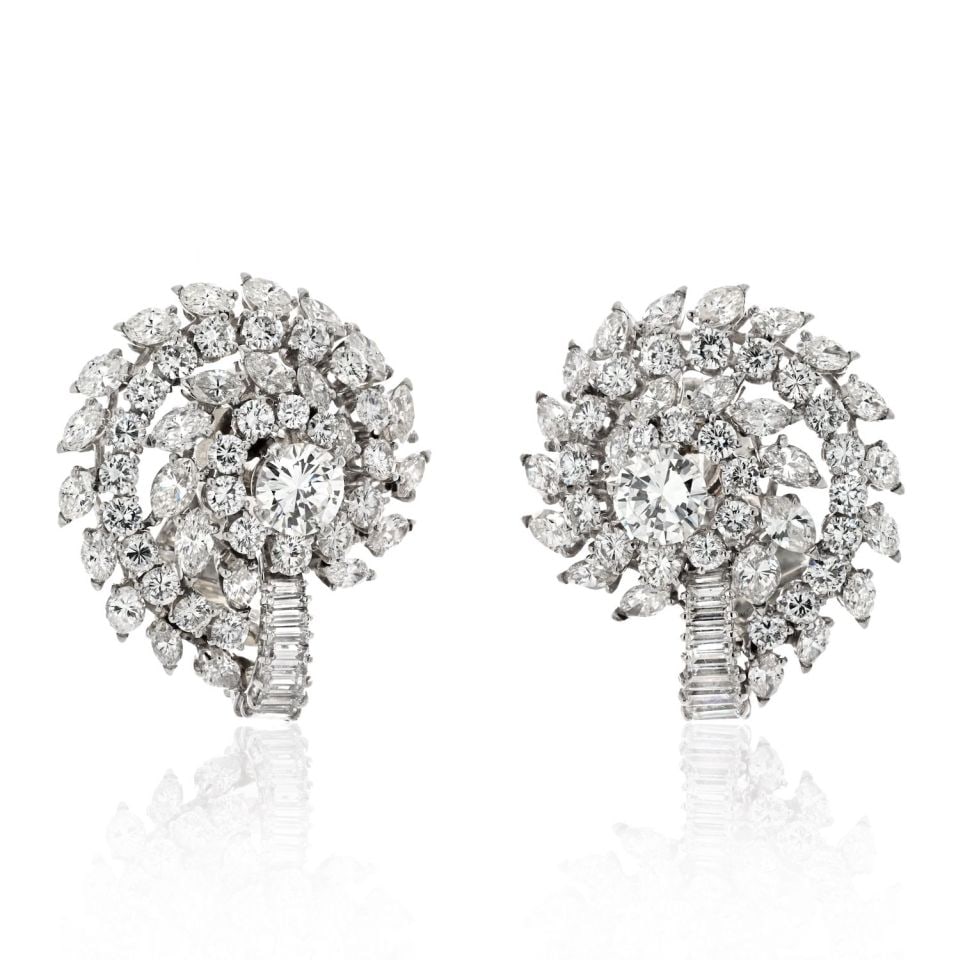 Vintage Platinum 16.00cttw Diamond Cluster Clip Earrings: Vintage Platinum 16.00cttw Diamond Cluster Clip Earrings Elevate your elegance with these stunning Platinum Cluster Diamond Clip Earrings. Crafted in luxurious platinum, these earrings feature a capti