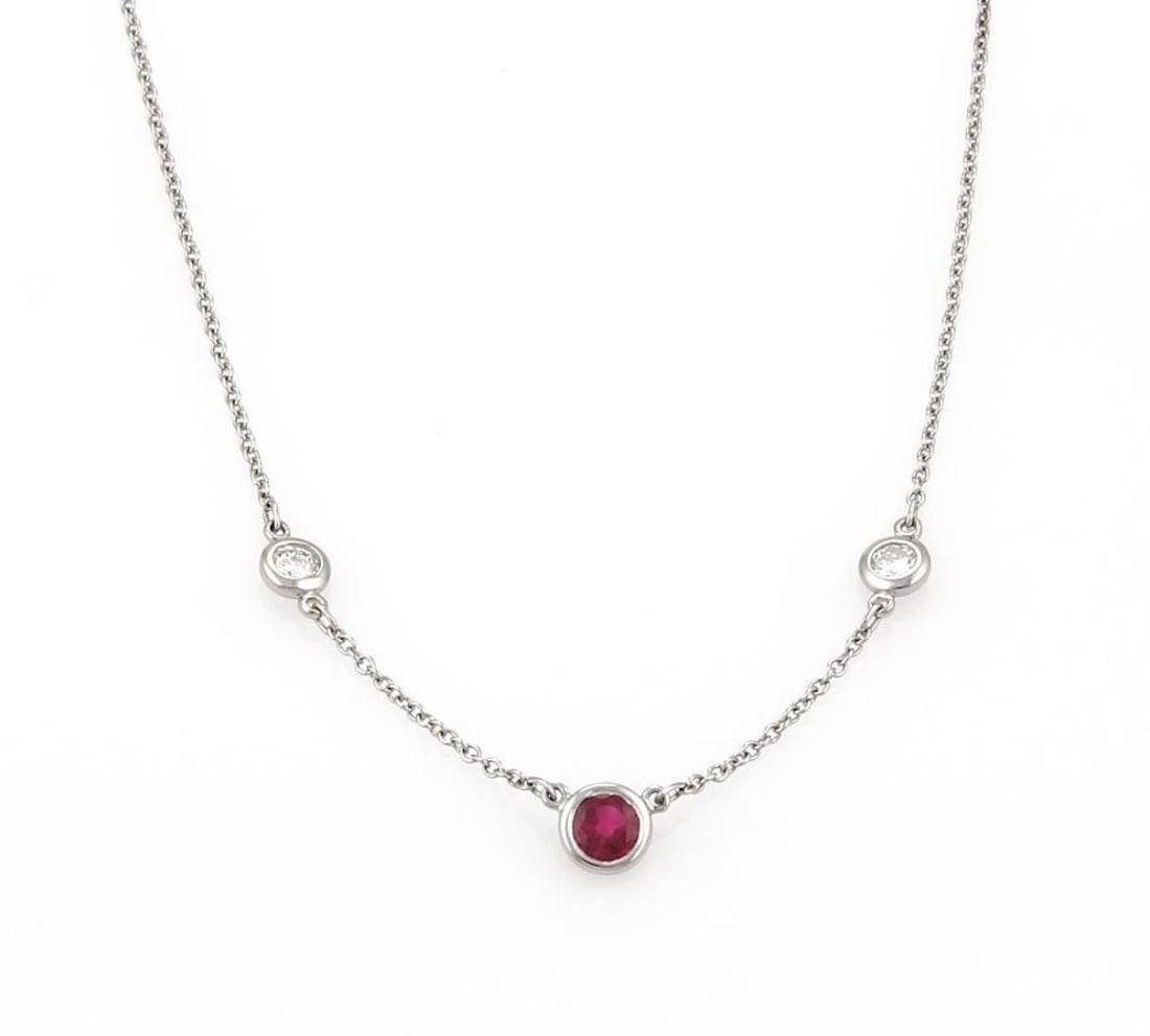 Platinum Peretti Color By The Yard Necklace With Ruby Diamond Accents: Platinum Peretti Color By The Yard Necklace With Ruby Diamond Accents This Tiffany & Co. Peretti Color By The Yard necklace features a delicate platinum chain adorned with a vibrant ruby and a sparkli