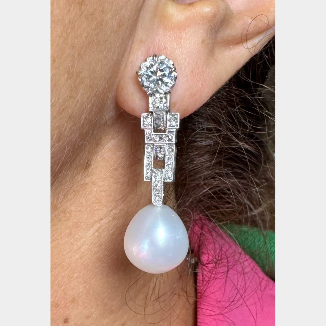 Art Deco Platinum Earrings with South Sea Pearls and 44 Diamonds: Art Deco Platinum Earrings with South Sea Pearls and 44 Diamonds This exquisite pair of Art Deco earrings showcases the elegance of South Sea pearls and sparkling diamonds. Crafted in platinum, the ea