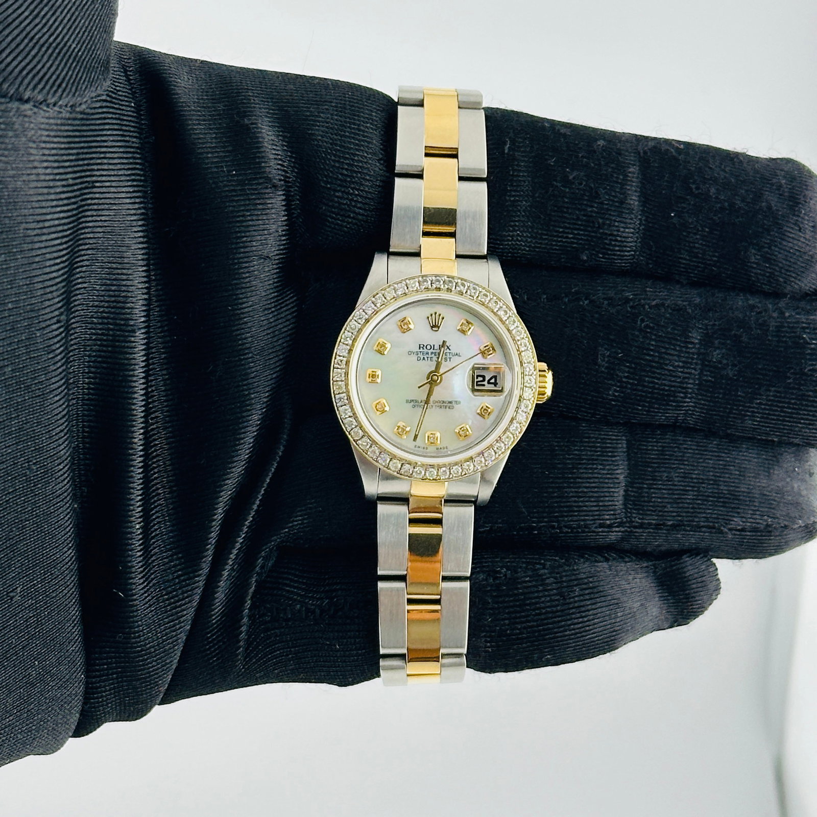 Ladies Datejust 69163 Aftermarket Diamond White MOP Dial Oyster Bracelet Watch: Ladies Datejust 69163 Aftermarket Diamond White MOP Dial Oyster Bracelet Watch This Rolex Datejust is designed for ladies and features an after-market white mother-of-pearl diamond dial. The watch inc