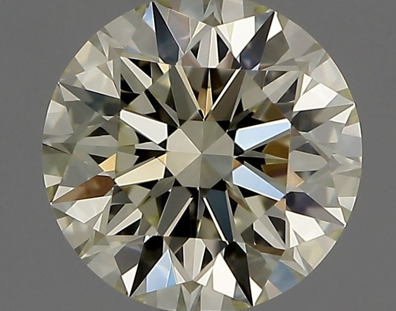Loose Diamond - ROUND 0.73ct M VS1: Loose Diamond - ROUND 0.73ct M VS1 Source: Natural Shape: ROUND Carats: 0.73 Color: M Clarity: VS1 Certification: IGI Video:
