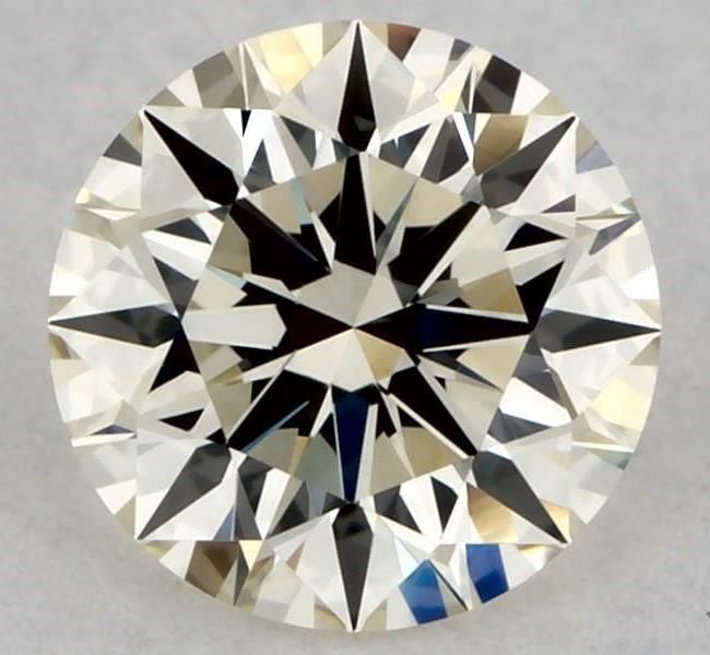 Loose Diamond - ROUND 0.5ct M VVS2: Loose Diamond - ROUND 0.5ct M VVS2 Source: Natural Shape: ROUND Carats: 0.5 Color: M Clarity: VVS2 Certification: GIA The Diamond Depot Guarantee: All items in this auction are guaranteed to be 100% a